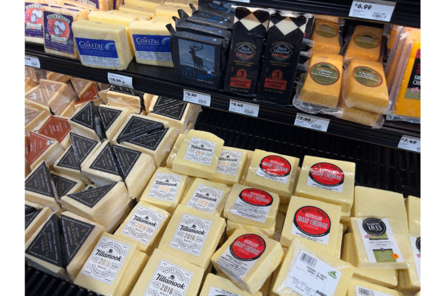 cheese grocery store dairy aisle consumers shopping retail