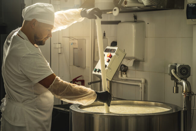 dairy processing worker cheese making facility food industry